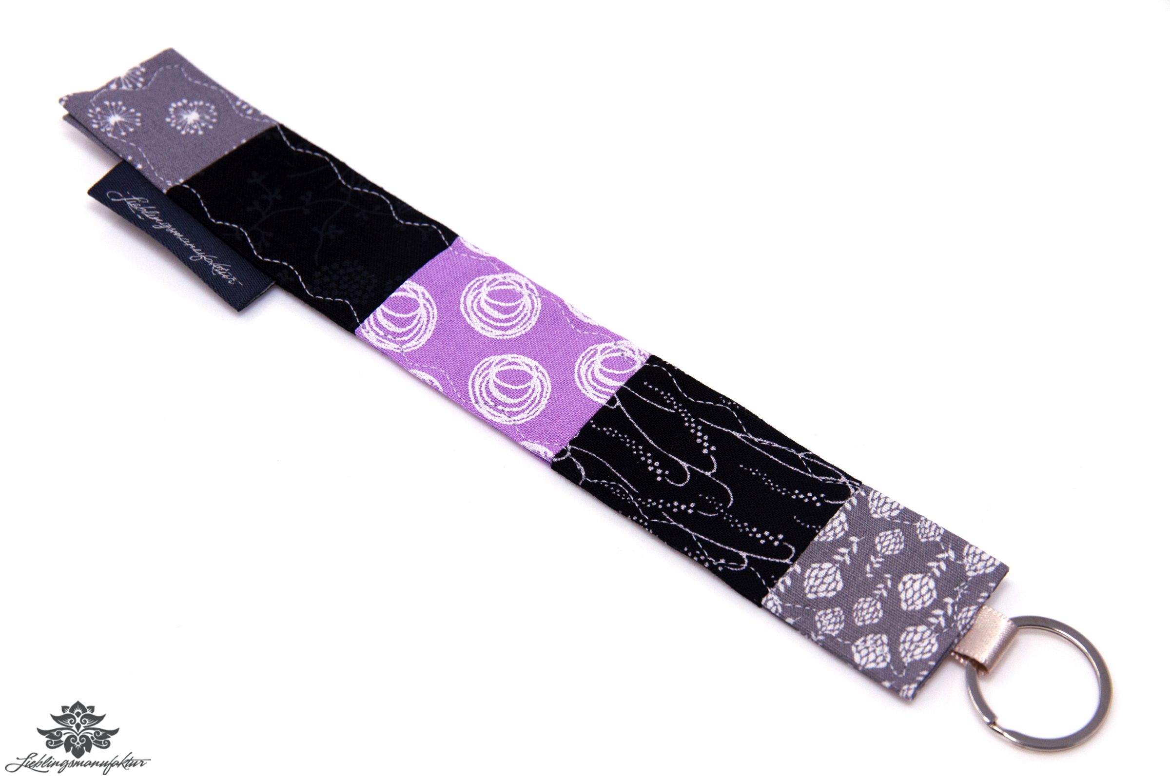 Schlüsselanhänger schwarz lila
